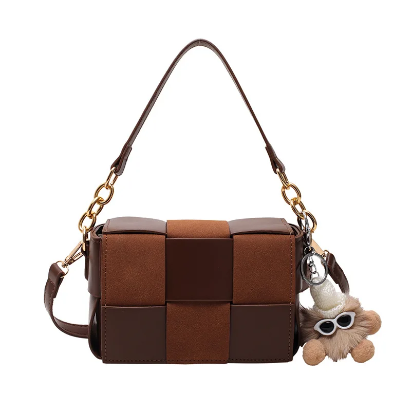 Brown belt with pendant