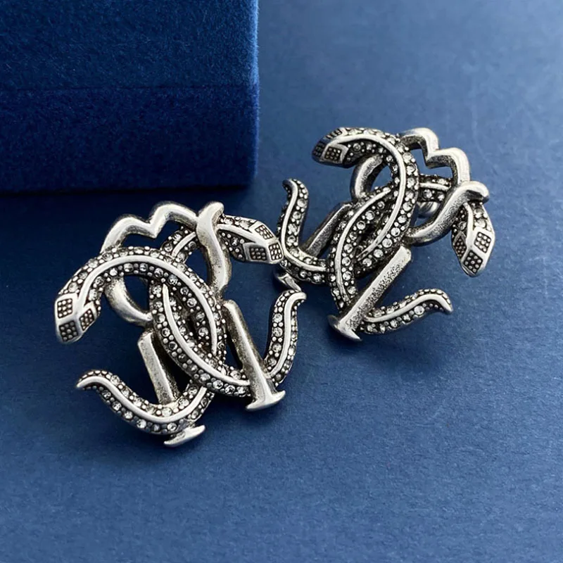 Donia Jewelry European and American Fashion Titanium Steel Micro-Inlaid AAA Zircon Double Snake Silver Needle Luxury Earrings