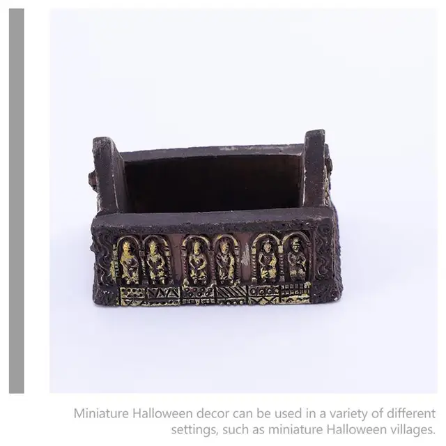 할로윈 분위기를 연출하는 마이크로 조경 관 상자 인형