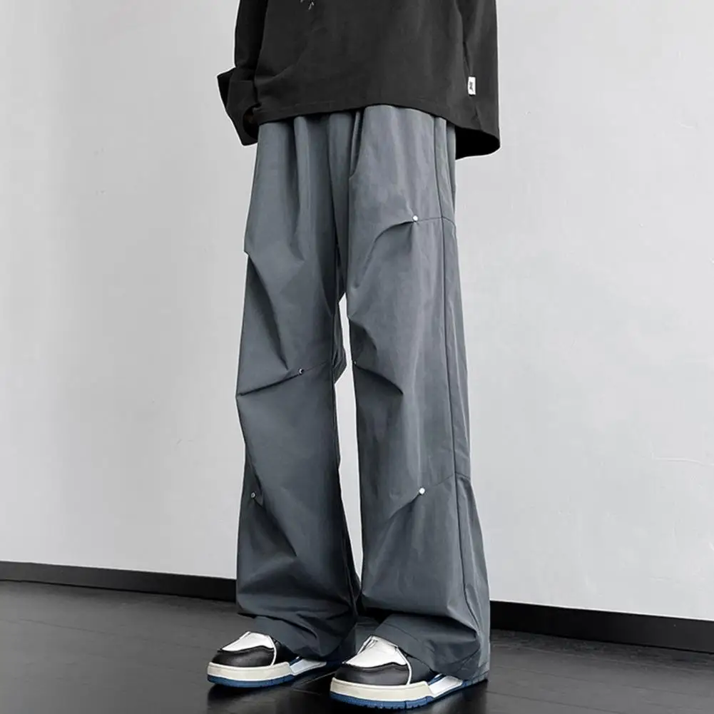 Description Picture 6 of itemSolid Color Men Trousers Men Straight-leg Pants Stylish Unisex Cargo Pants with Rivet Decor Wide Loose Fit for Streetwear