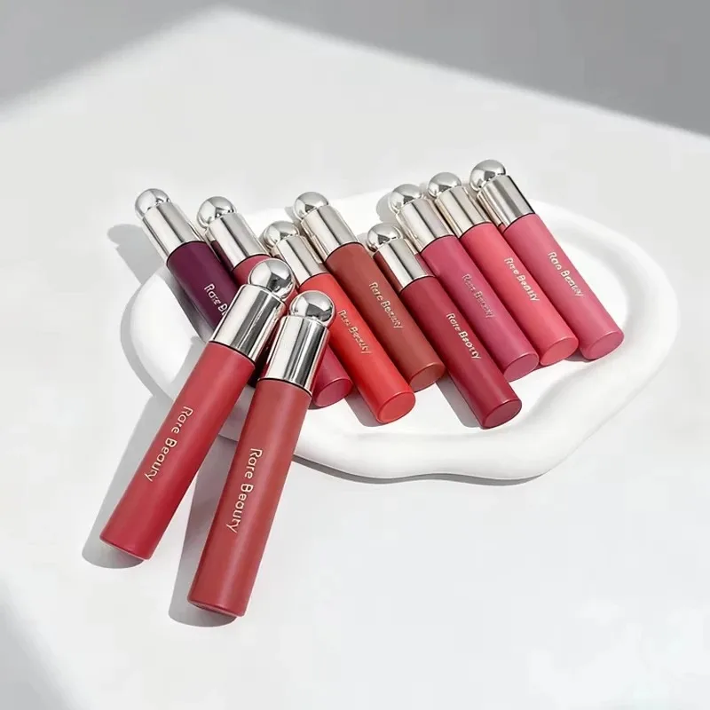 Rare Beauty Blush Lip Gloss illumine le teint, est soyeux et magnifique, et rehausse les contours. Maquillage pour filles et femmes avec boîte. 1 Rare Beauty Blush Lip Gloss illumine le teint, est soyeux et magnifique, et rehausse les contours. Maquillage pour filles et femmes avec boîte. 1