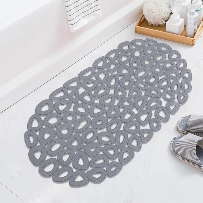 Gray bathroom mat with suction cups, quick-drain holes, and massage rings.