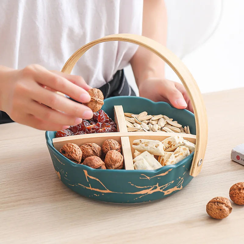 

Gold series ceramic hand-held divided fruit plate dried fruit inventory heart candy snack storage box nut platter nordic plate