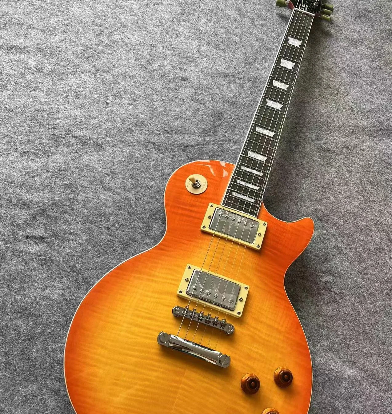 

2024 The factory has inventory of top quality Paul rosewood body rosewood fingerboard flame standard solid electric guitar XDAda