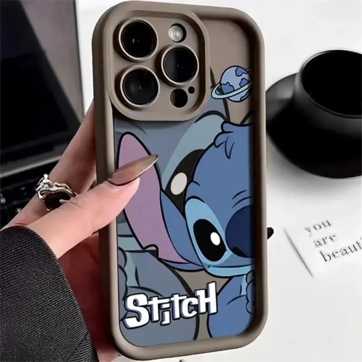 thumbnail image 1 of Funda de silicona de Disney Stitch para iPhone, carcasa suave a prueba de golpes para modelos 14, 11, 12, 13, 15 Pro Max, X, XR, XS Max, 8, 7, 15 Plus, SE 2020, 1 of 5