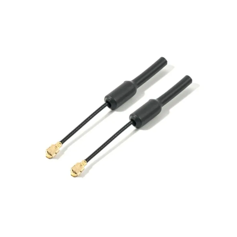 Antennes FPV BETAFPV 5.8G 2dBi RHCP en main, comparées à une pièce de monnaie