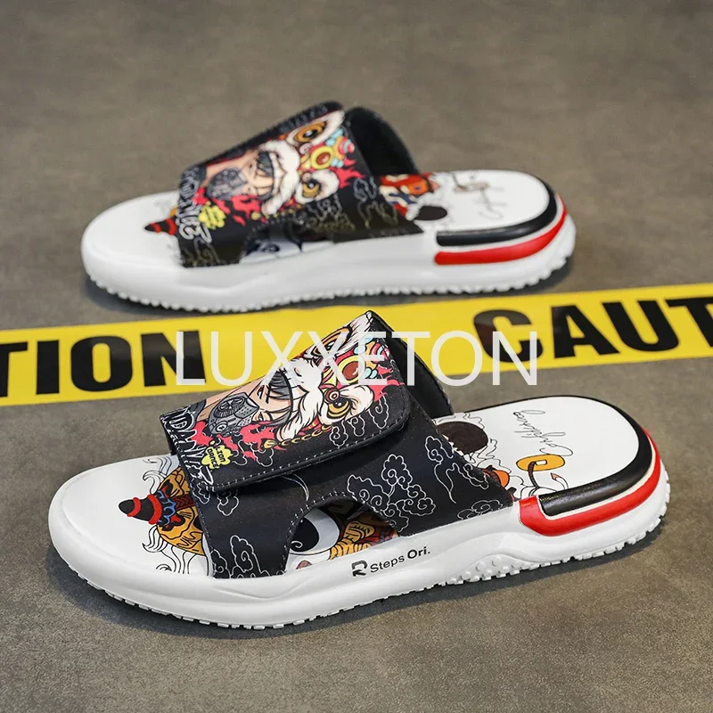 Indoor and outdoor waterproof sandals spring and summer men's new cool beach slippers fashionable ethnic style totem soft sole