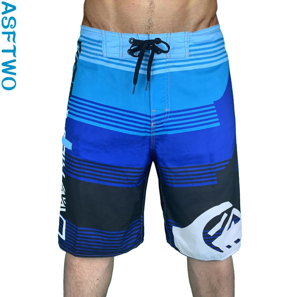 

Men's sweatpants 2023 summer surfing quick-drying beach pants loose casual plus size five-point shorts.