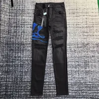 me embroidery python snake distressed jeans 1