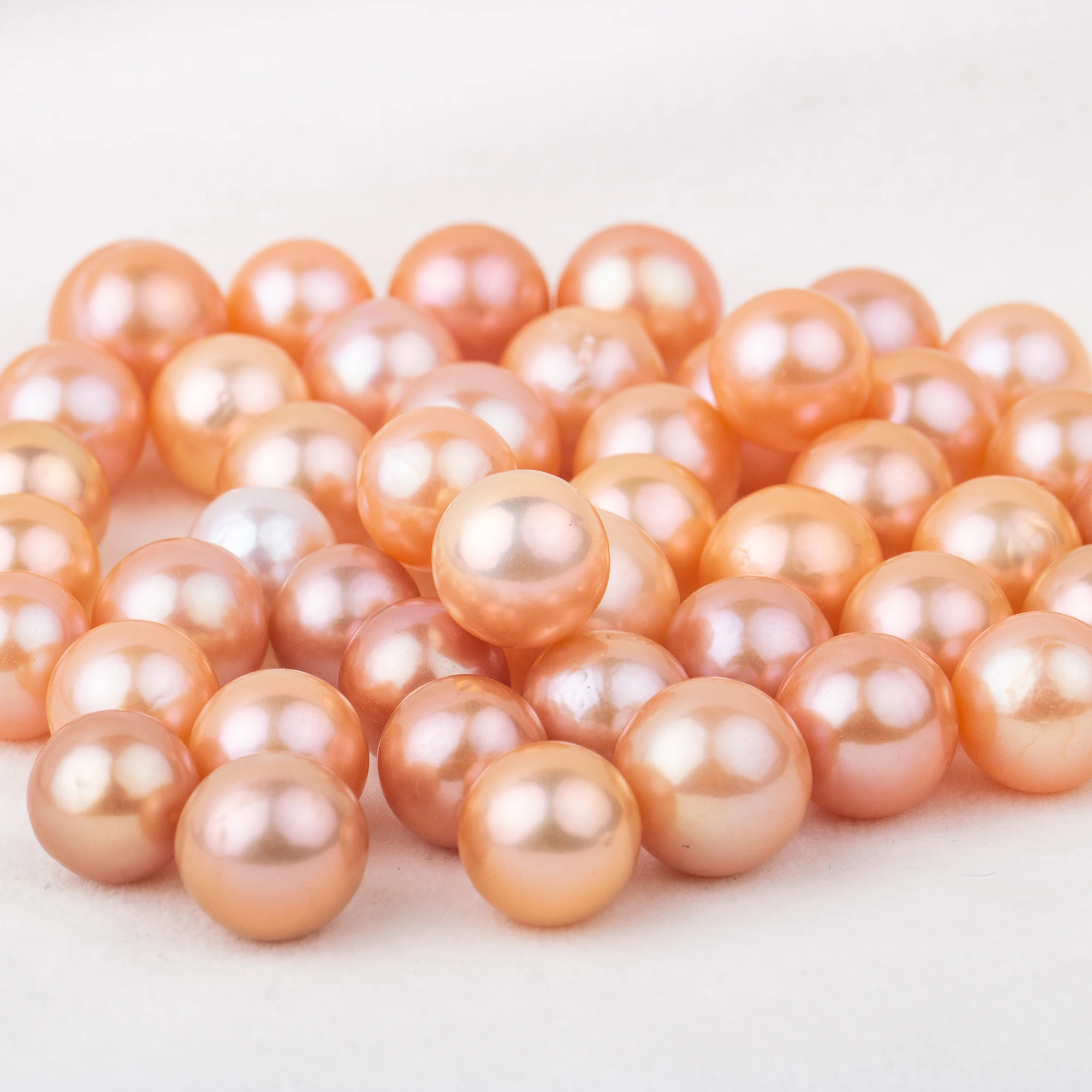 

9-12mm cultured orange Edison Pearl High quality loose freshwater pearl round shape