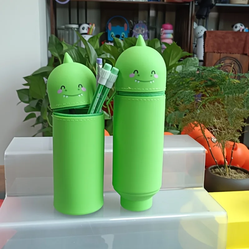 حامل أقلام بتصميم ديناصور من السيليكون - صندوق تخزين أقلام بسحاب قابل للتوسيع، مادة السيليكون مناسبة لبدء موسم المدرسة