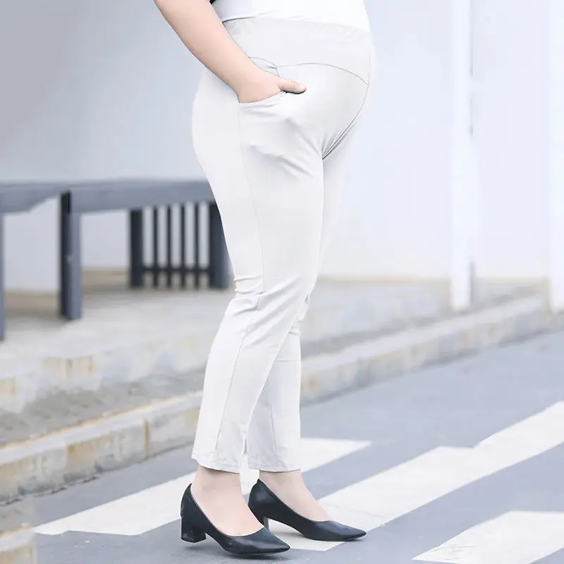 Personality Street Summer Thin Plus Size Solid Color Nine Points Pants Womens Casual Elastic High Waist Pockets Pencil Trousers