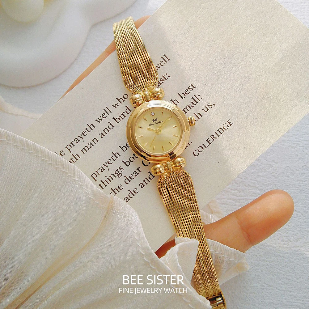 ساعة نسائية ذهبية عتيقة بحزام شبكي مقاوم للماء كوا...