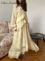 Robe longue élégante à volants imprimés pour femmes, à lacets, col en V, manches longues, coupe trapèze, robes de rue tendance du début du printemps 2026 4