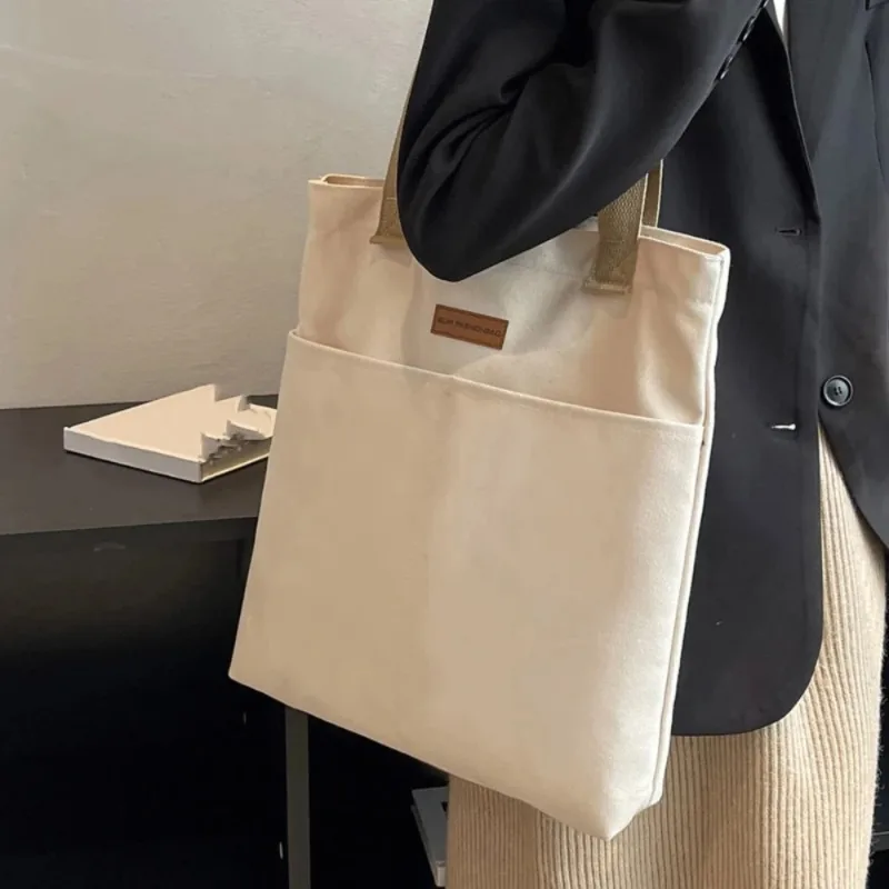 Portable Women's Handbag with Canvas Sewing Thread, Large Capacity, High-end Feel, Convenient and Practical Commuting Bag