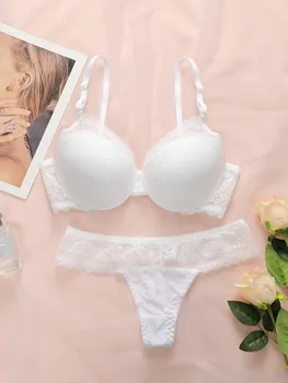 Hot selling women's sexy embroidered lace bra set with steel ring gathering push up and seamless thong set B6064