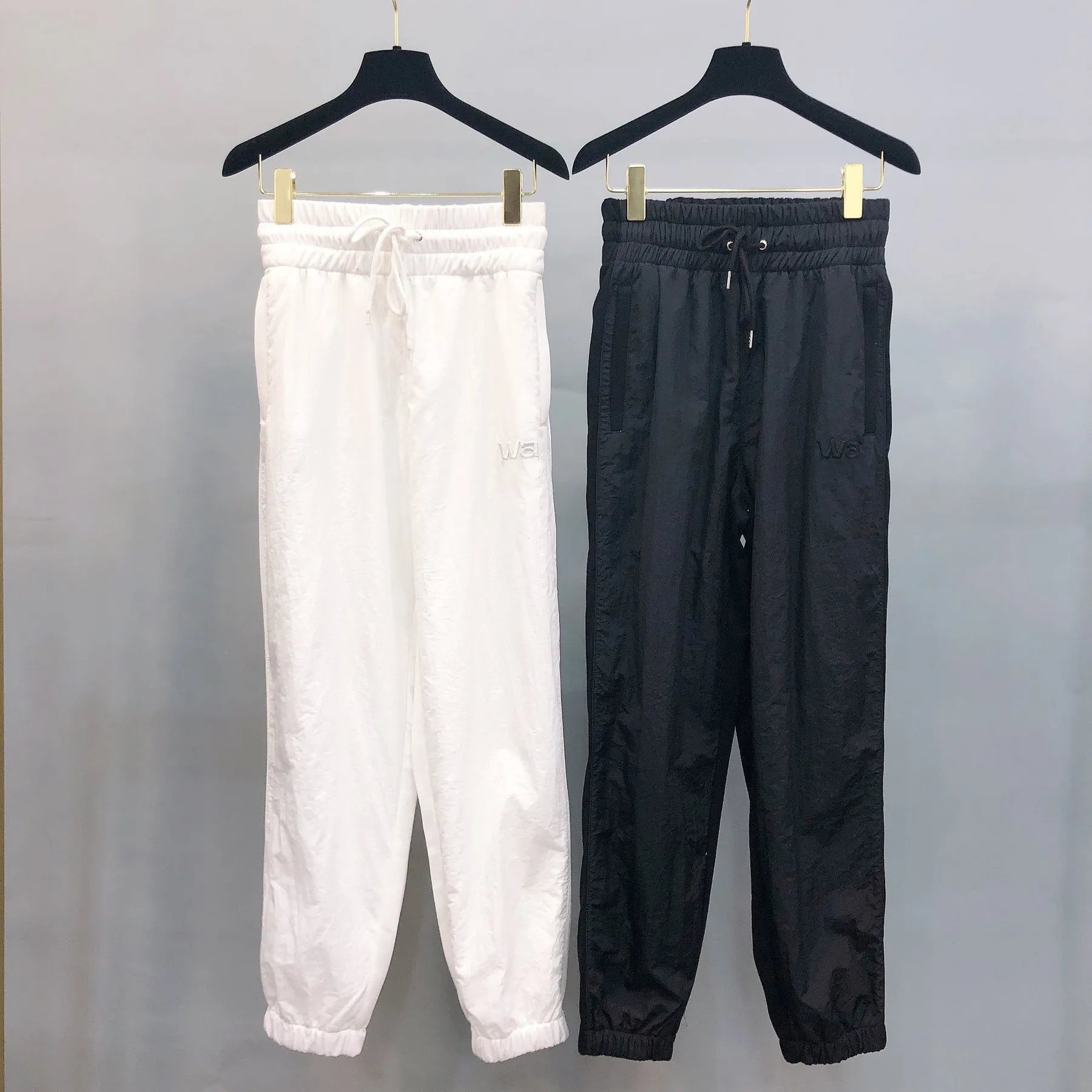 

2023 Early Autumn High Waist Drawstring Elastic Waist Sports And Leisure Front And Back Combination Sports Pants