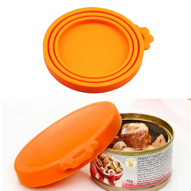 Set 2 In 1: Apriscatole E Cucchiaio Per Cibo Umido + Coperchi Silicone Per Scatolette