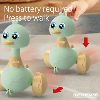 Pressing and rebounding toy, rocking duck baby puzzle toy, learning crawling sensory toy (Green Duck) 1