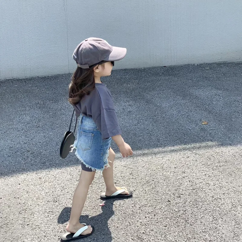 

Летний костюм для девочек, Корейская версия, новинка, футболка средней длины с коротким рукавом и надписью и джинсовая юбка в иностранном стиле, комплект из двух предметов