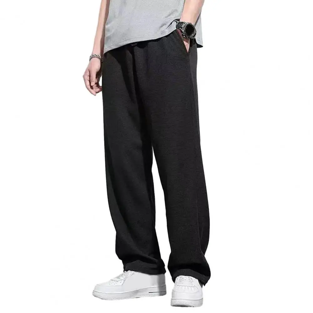 

Men Loose Sweatpants Men Sweatpants Cozy Men's Winter Pants Elastic Waist Plush Pockets Waffle Texture Ideal for Casual Sports