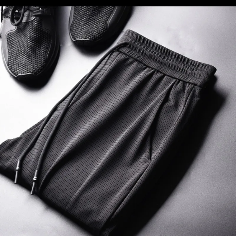 24 Men's Summer Ice Silk Pants Mesh Breathable Casual Thin Quick Dry Pants Loose Elastic Beam Feet Pants Sports Fitness Trousers