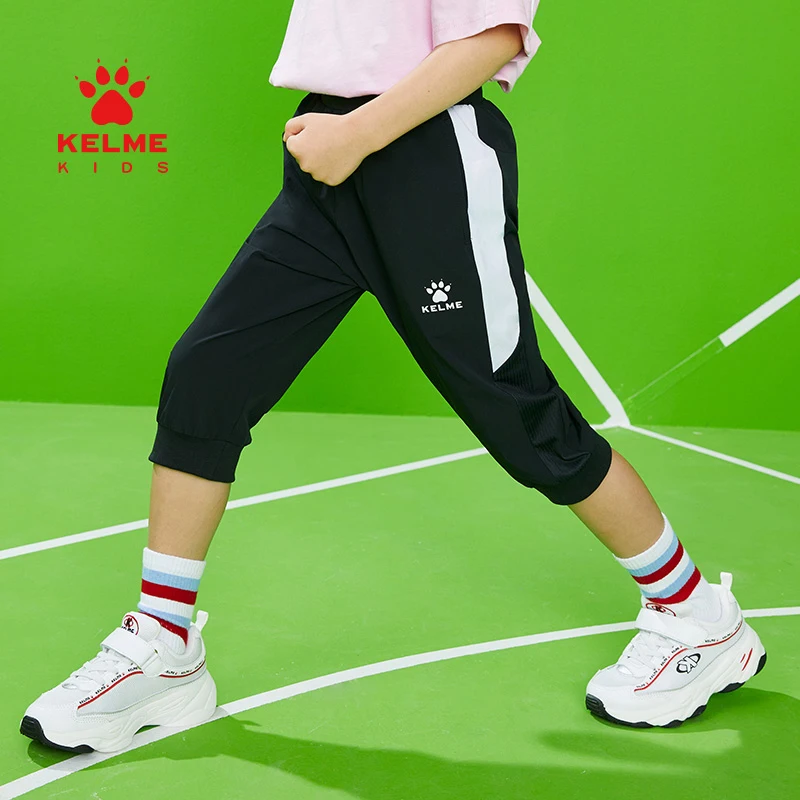 

Детские шорты KELME укороченные штаны для мальчиков и девочек уличные быстросохнущие дышащие быстросохнущие спортивные тонкие шорты 5221ZK4057