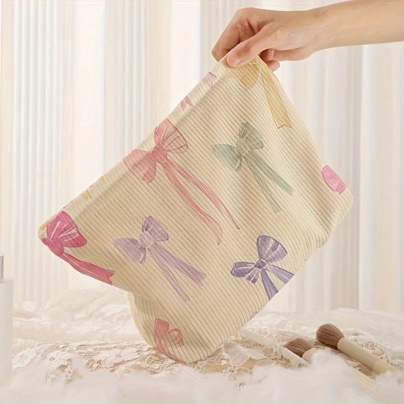 Minimally designed bow pattern printed corduroy zipper makeup bag, lightweight and multifunctional cosmetic storage bag