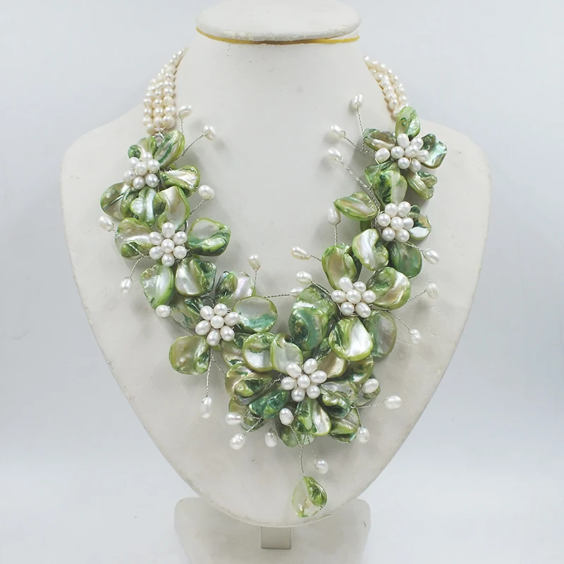 

Natural pearl shells and white freshwater pearls. Woven flower necklace. Women's Memorial Classic Jewelry 20"