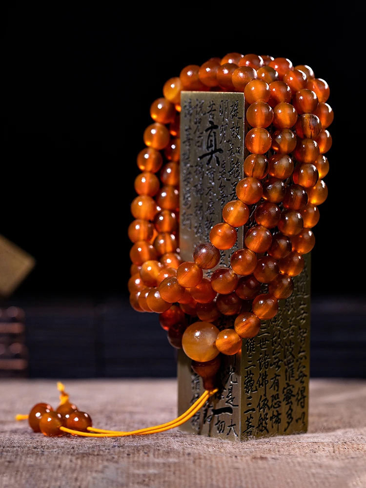 

Natural Horn 108 Buddha Beads women's multi-circle Bracelet Honey Color Blood Material National Wind String 1.0 Rosary Fidelity