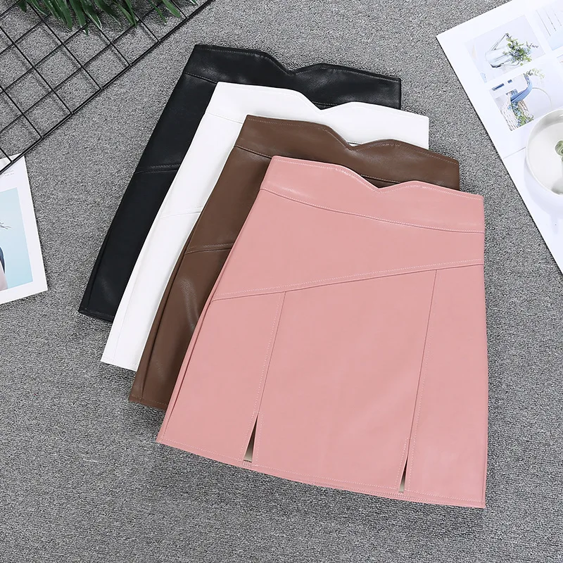 

Корейские новые женские юбки из искусственной кожи с высокой талией, однотонная ассиметричная мини-юбка с разрезом, модные Универсальные облегающие женские юбки