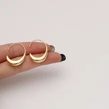 

2021 new pop European and American exaggerated personality trend 14K Gold coated smooth water drop earrings Korea versatile