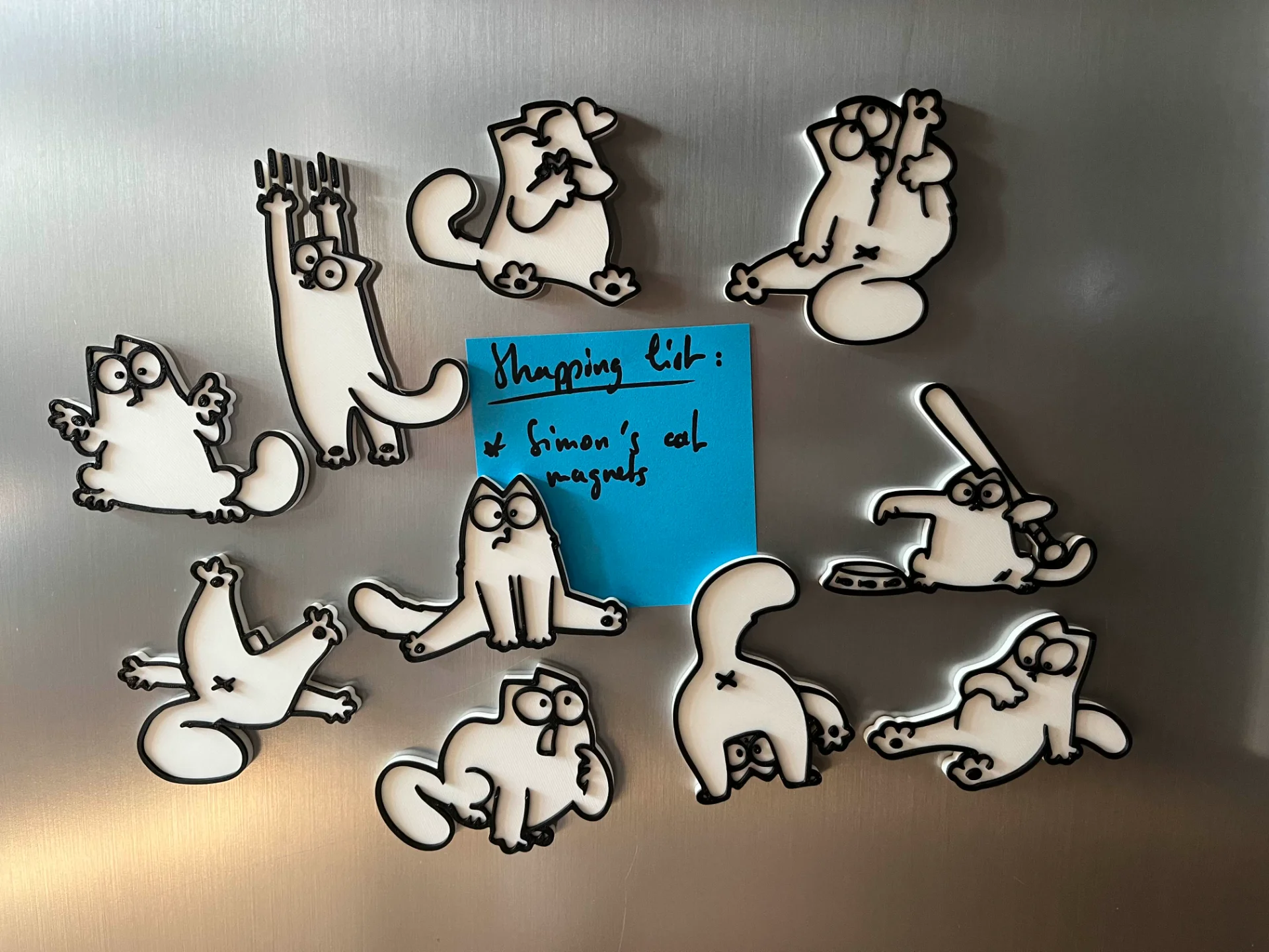 A set of 10 3D printed Simon's Cat refrigerator magnets 1