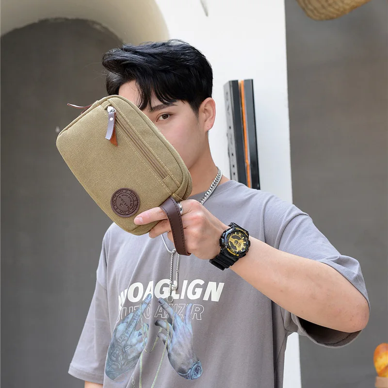 

Men's Handheld Canvas Travel Bag One Size Change Bag Card Bag