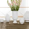 Scandinavian White Ceramic Vase Decoration Home Decoration Crafts Modern Interior Decoration Countertop Vase Art Face Shape Vase 4