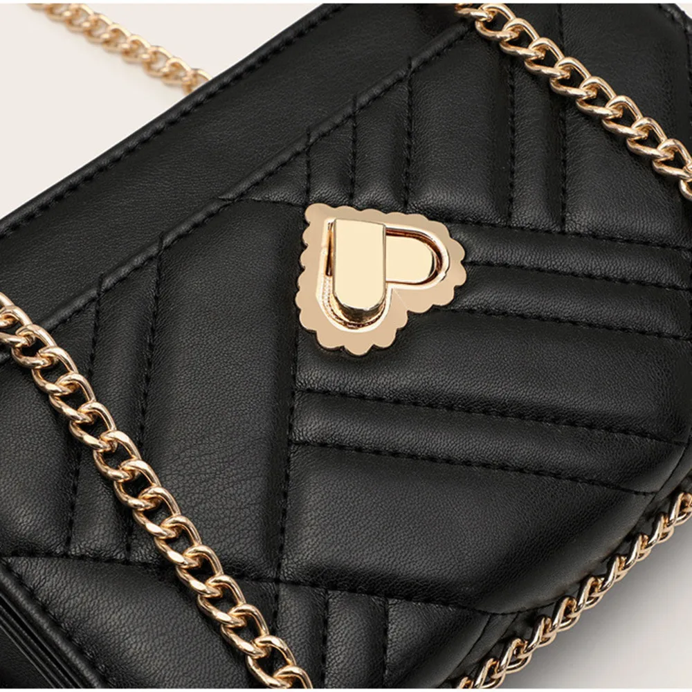 Borsa a tracolla donna versatile con ricamo e catena alla moda_voghion.com
