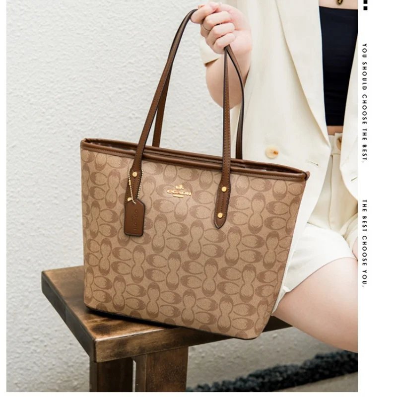 Borsa tote vintage con manico a contrasto, aperta sul davanti, spaziosa e leggera, per impiegati, pendolari e per le spese quotidiane.