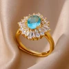 Bagues de luxe en Zircon coloré bleu pour femmes, en acier inoxydable plaqué or, fleur papillon, bijoux brillants de fête exquis, 2025