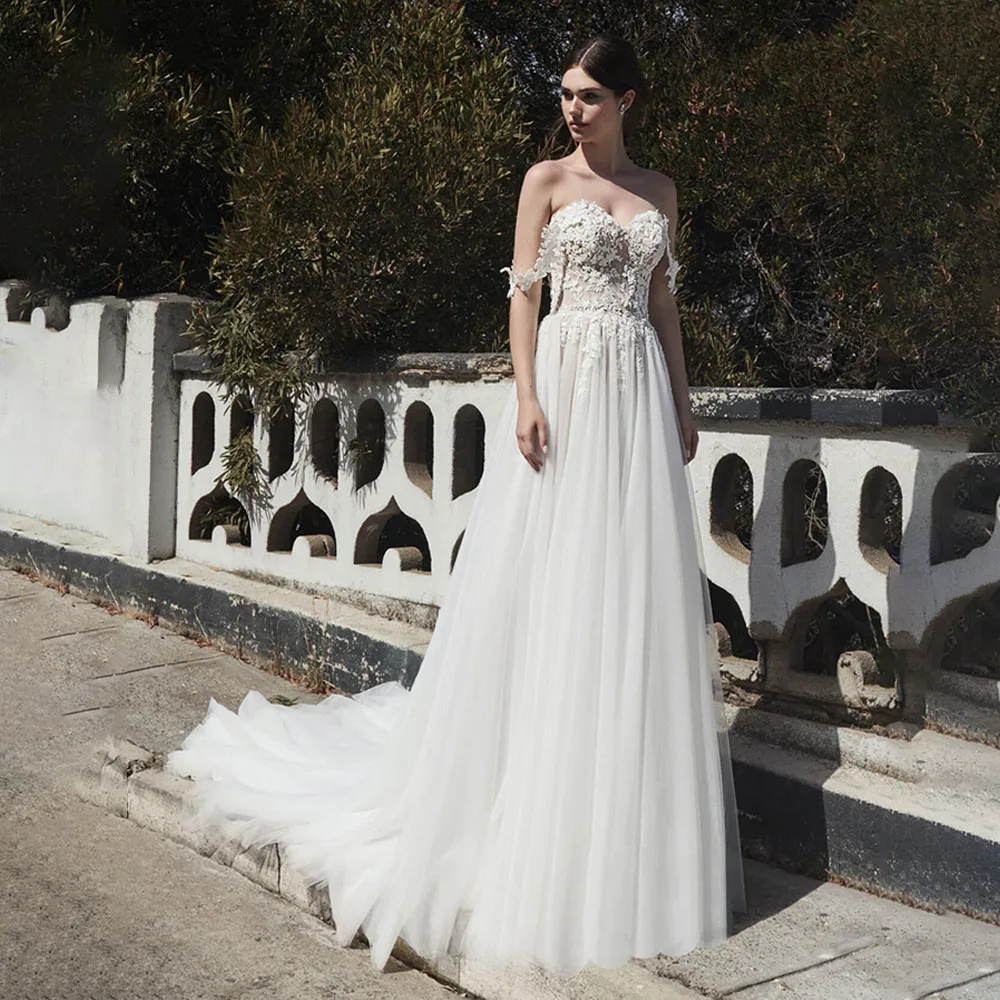

Elegant Off Shoulder Sweetheart Appliques Wedding Dresses Sweep Court Wedding Gown Backless Tulle Bridal Gown Vestidos De