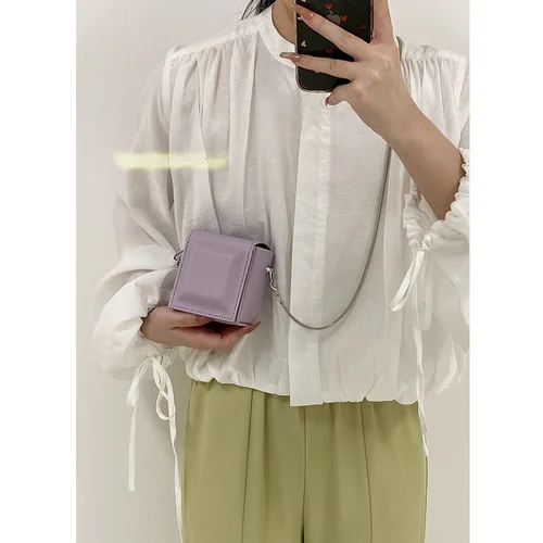 올해 인기있는 핑크 미니 작은 가방 여성 여름 2023 새로운 패션 질감 체인 가방 어깨 메신저 가방 2
