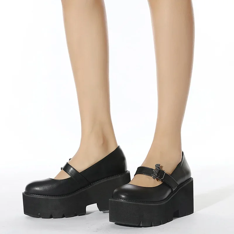 Medallion Heel Loafer