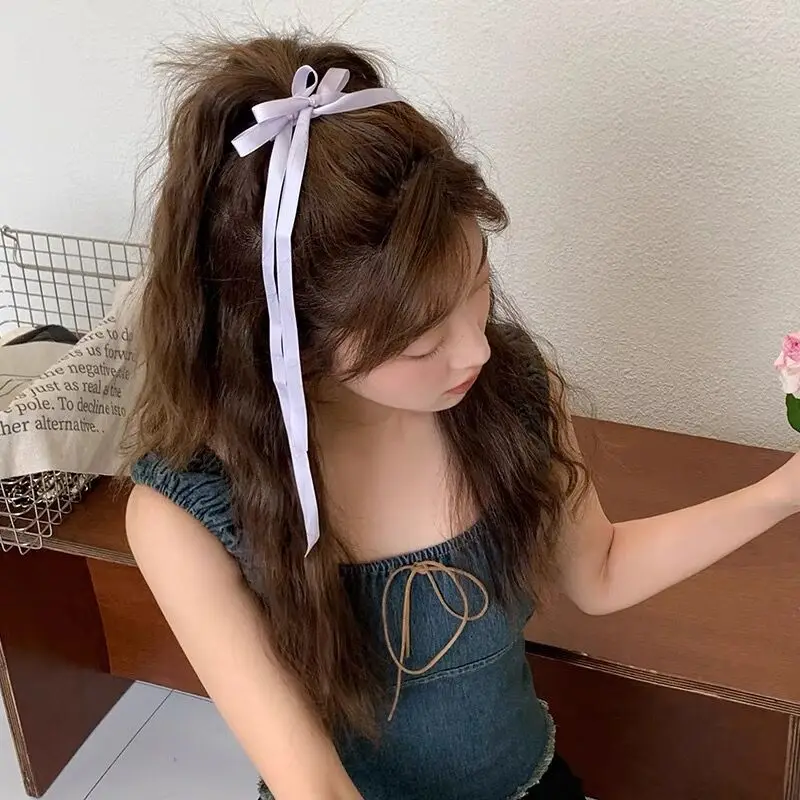 Рисунок 6 - Заколки для волос с длинными лентами и кисточками