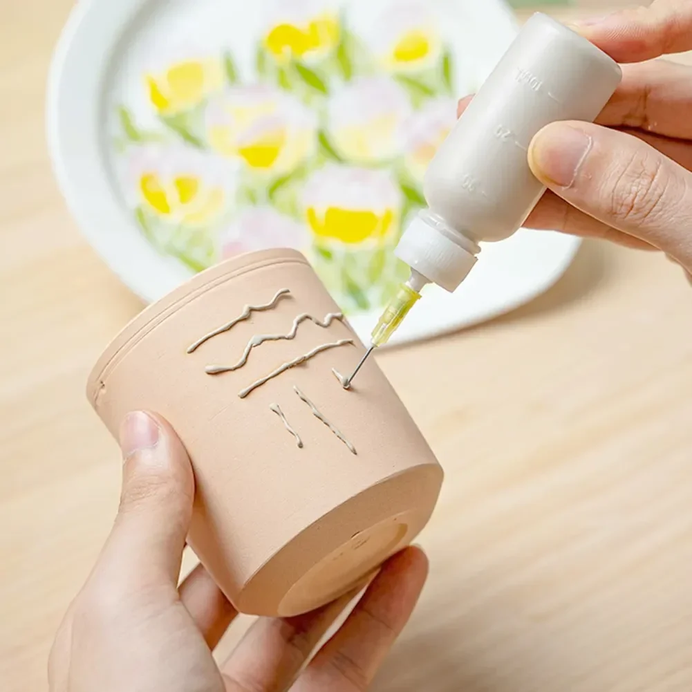 Description Picture 3 of item50ml Pottery Mud Painting Bottle with Nozzle Set Squeeze Mud Bottle with Needle DIY Ceramic Texture Pottery Clay Sculpture Tool