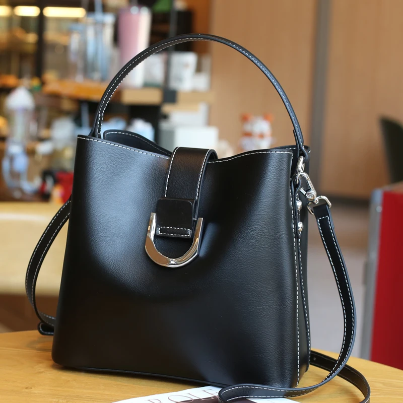 

Leather Women's new fashion bucket bag Versatile broadband one-shoulder messenger bag Simple portable bag