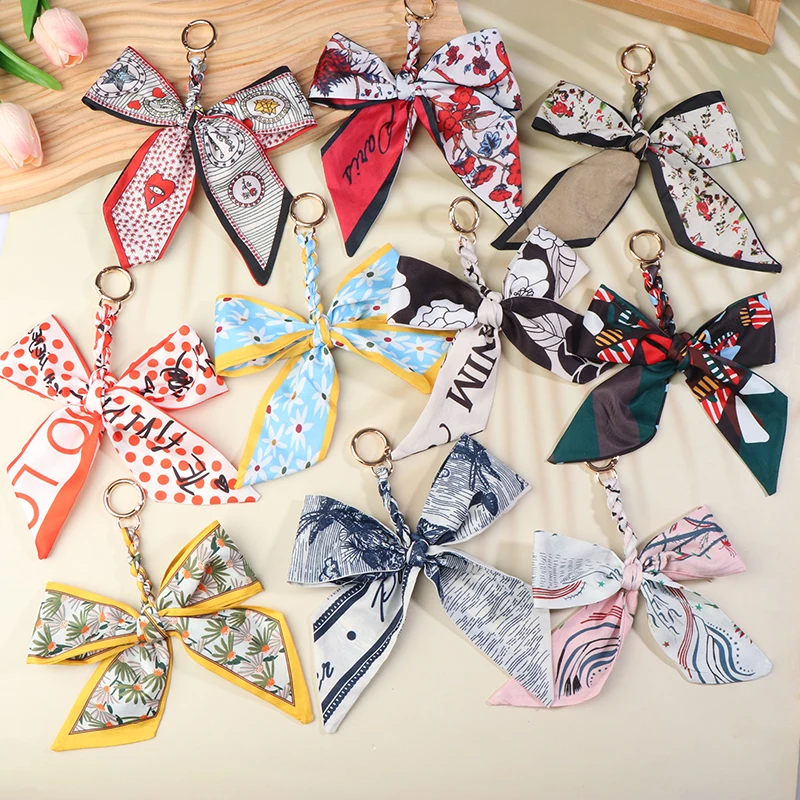 Koreanische Weiche Seide Schal Schlüsselring Elegante Band Bowknot Schlüsselbund Auto Schlüssel Halter Frauen Tasche Charme Schlüssel Zubehör Für Mädchen Geschenke – Detail 1