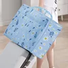 1pcs non-woven zou chrysanthemum storage bag, wide handle, smooth zipper, dustproof and mildew-proof, suitable for clothes, etc 2