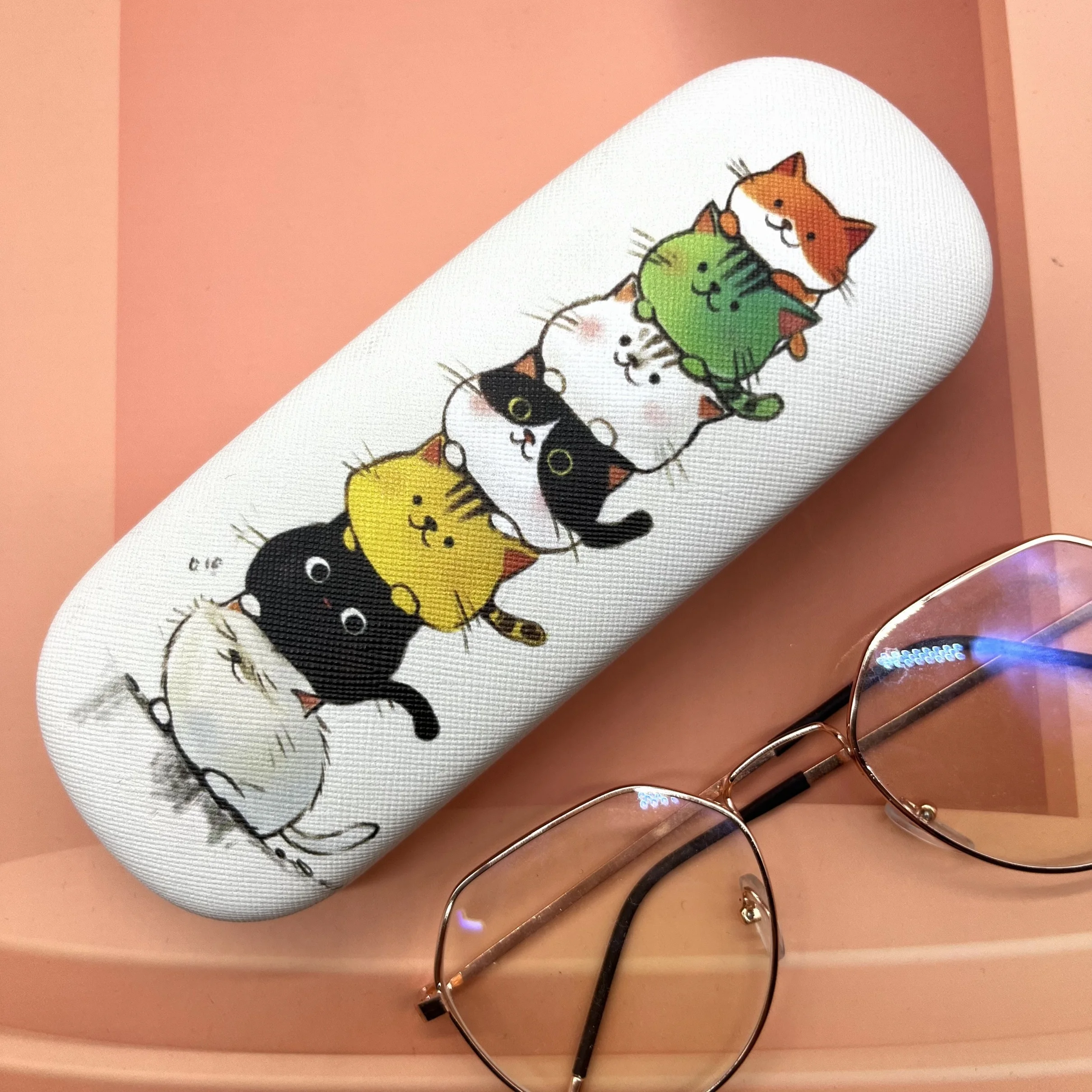 A cute round headed cat themed glasses case, stylish and