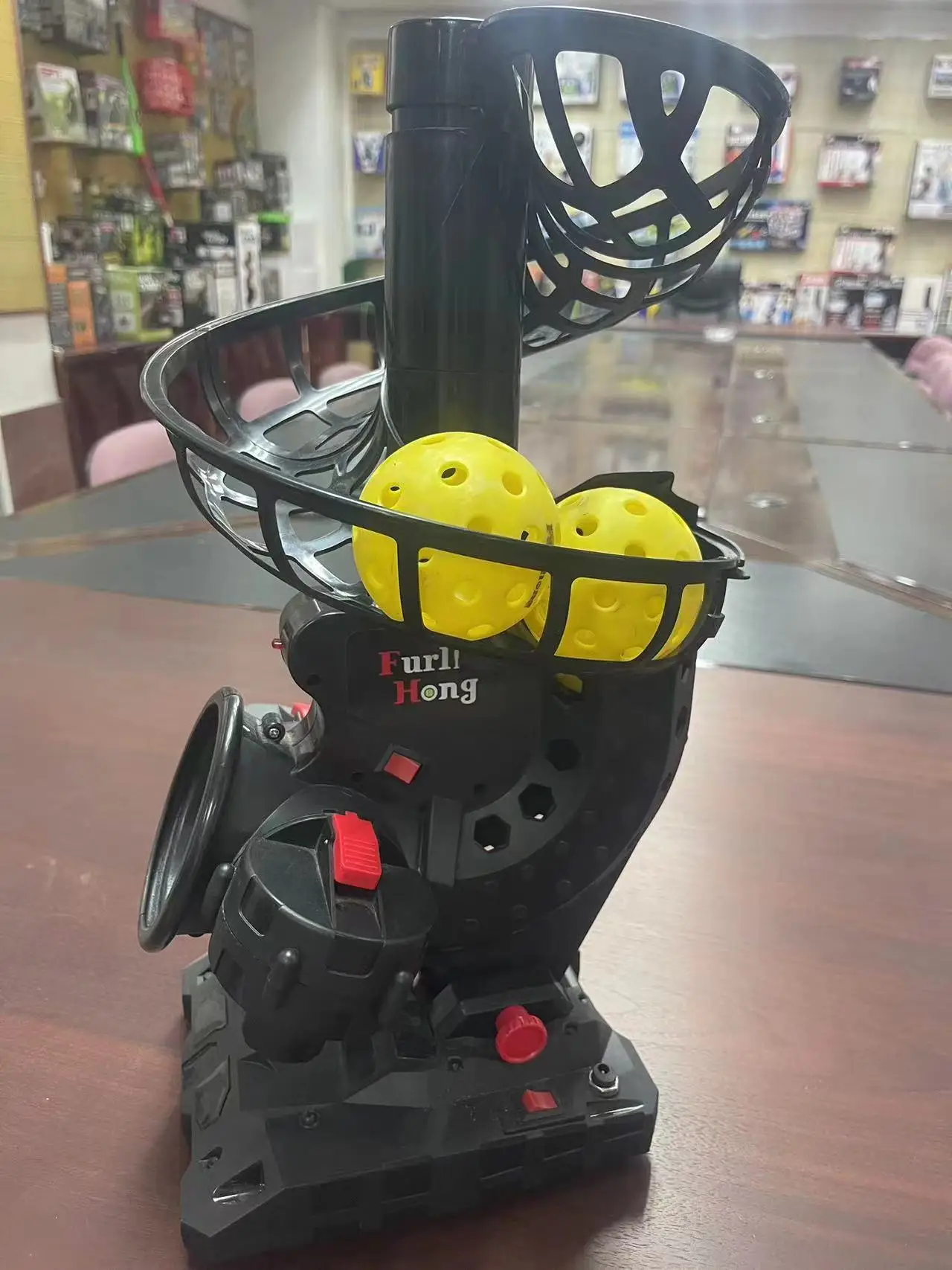 

New pickleball server with charger and two sets of ball tracks (one set/four pieces)