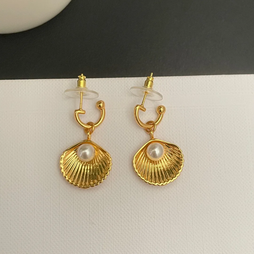 

Simple retro shell pendant earrings personality temperament earrings