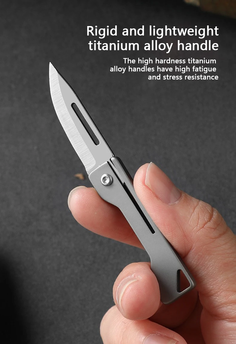 Cuțit utilitar deschis afișând lama din oțel inoxidabil